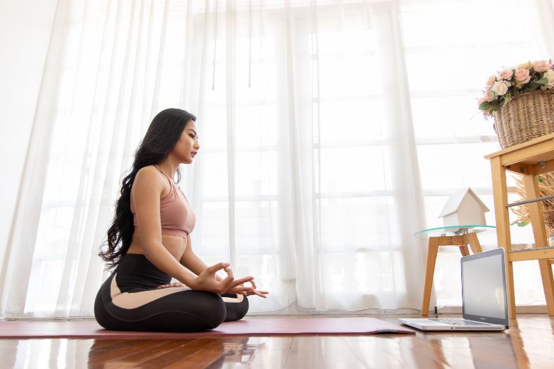 Zone Your Way to Comfort - Woman Doing Yoga in Her Room.