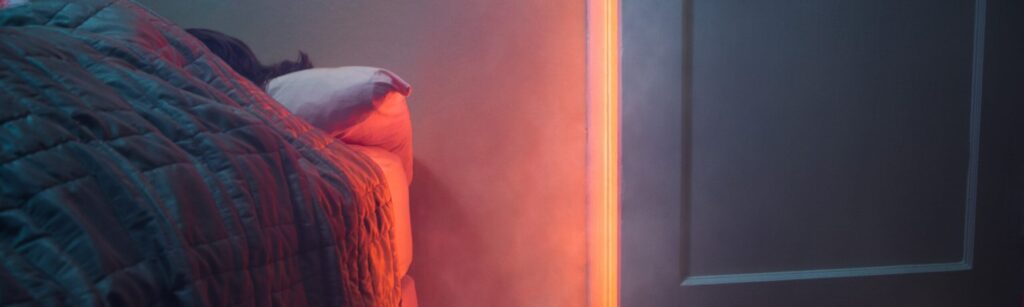 Homeowner sleeping in bed while carbon monoxide fills her home.