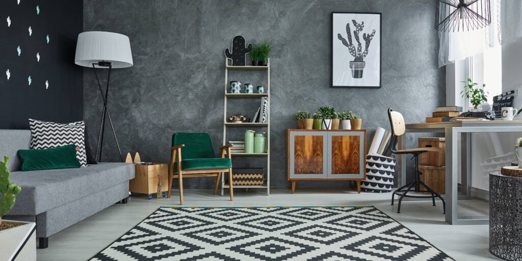 Grey room with pattern carpet.